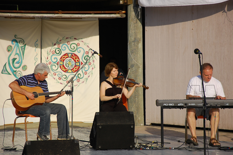 [dsc_5997.jpg] Melody Cameron on fiddle accompanied by Sheumas MacNeil on keyboards and Derrick Cameron on guitar