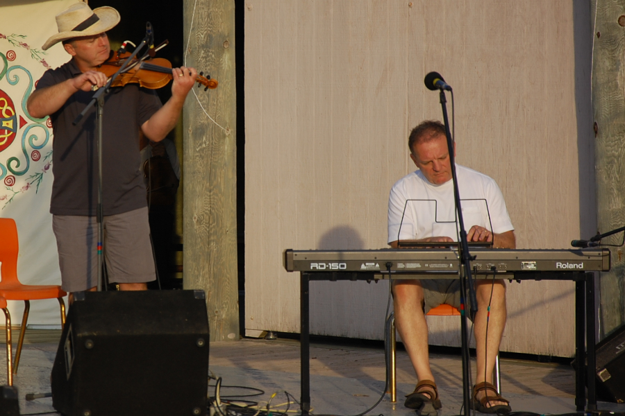 [dsc_6037.jpg] Kyle MacNeil on fiddle accompanied by Sheumas MacNeil on keyboards