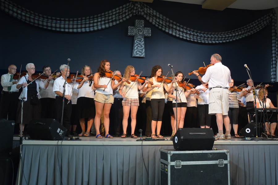 Cape Breton Fiddlers’ Association First Group Number, directed by Eddie Rogers and accompanied by Leanne Aucoin on keyboards