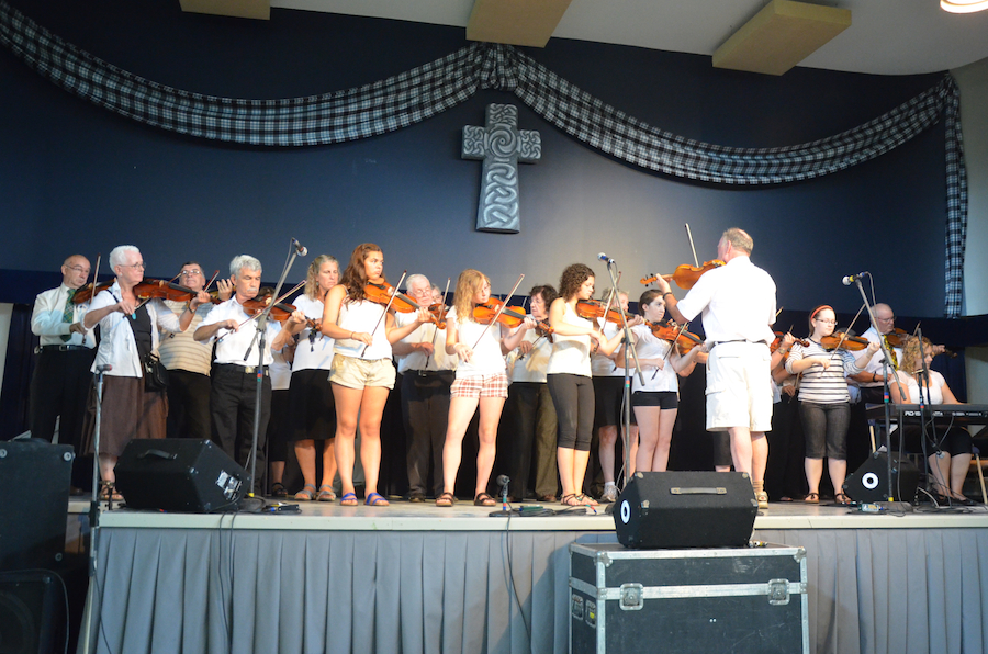 Cape Breton Fiddlers’ Association First Group Number, directed by Eddie Rogers and accompanied by Leanne Aucoin on keyboards
