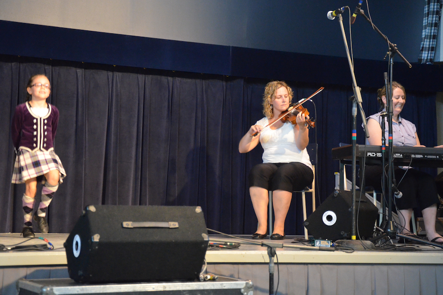 Drea Shepherd step-dancing to the music of Leanne Aucoin on fiddle and Susan MacLean on keyboards