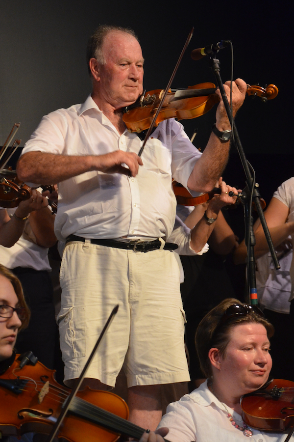 Eddie Rogers on fiddle and directing