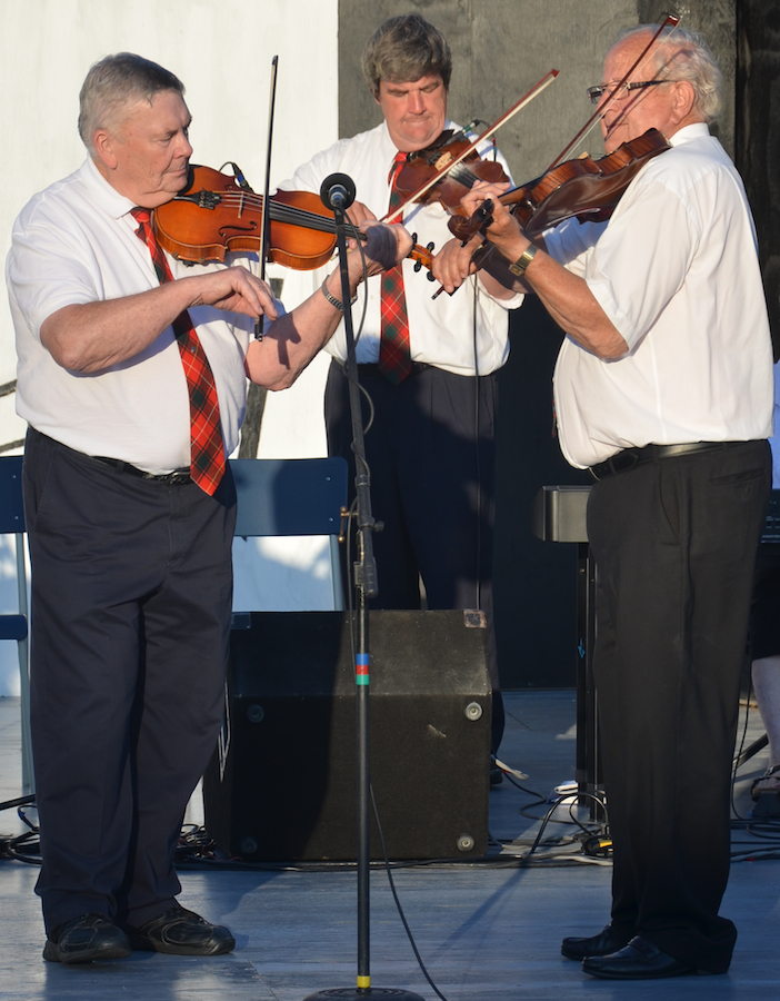 Donald Joseph MacPhee, David MacPhee, and Duncan ‘the Farmer’ McDonald on fiddles