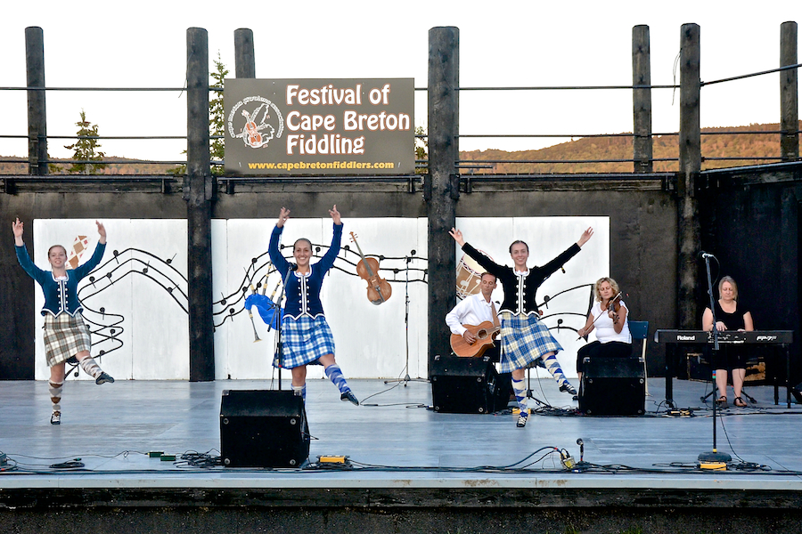 Nicole Jamieson, Taylor Ranni, and Sarah MacDougall Highland dancing to the music of Leanne Aucoin on fiddle accompanied by Susan MacLean on keyboard and Jesse Lewis on guitar