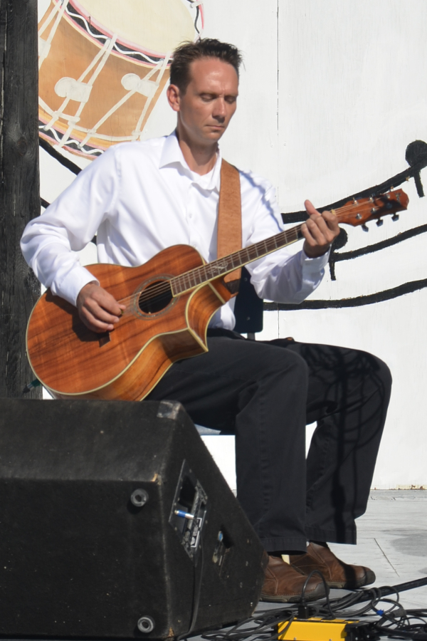Jesse Lewis on guitar