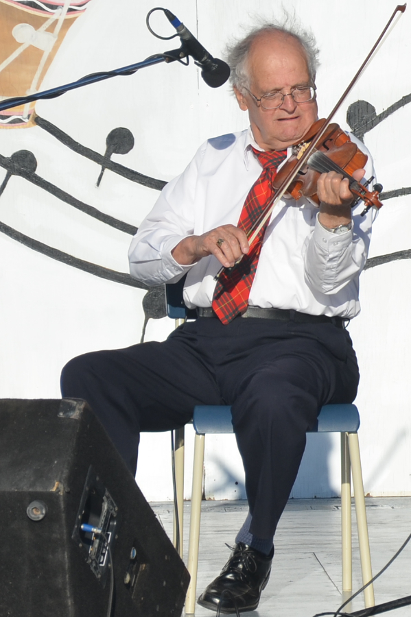 Father Francis Cameron on fiddle
