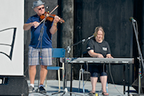 Kyle MacNeil on fiddle accompanied by Susan MacLean on keyboard