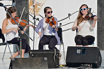 Michaela Forgeron, Natalie DeCoste, and Kayla Marchand on fiddles