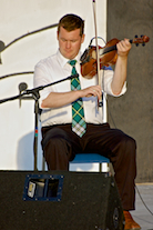 Kyle MacDonald on fiddle