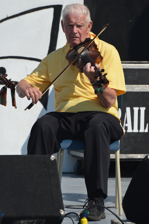 Father Charlie Cheverie on fiddle
