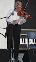 Father Francis Cameron on fiddle