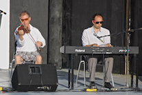 Larry Parks on fiddle accompanied by Kolten MacDonell on keyboard