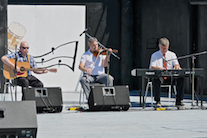 Rodney MacDonald on fiddle, accompanied by Lawrence Cameron on keyboard and Mike Barron on guitar