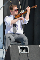 Kyle Kennedy MacDonald on fiddle