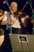 Fr Charlie Cheverie on fiddle