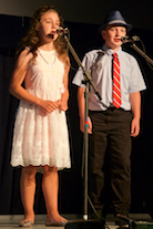 Ava and Thomas Paufler singing a cappella