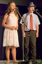 Ava and Thomas Paufler singing a cappella