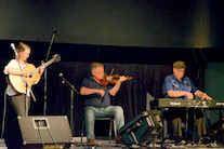 Howie MacDonald on fiddle accompanied by Doug MacPhee on keyboard and Mary Beth Carty on guitar