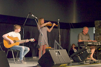 Mary Anna MacNeil on fiddle, accompanied by Sheumas MacNeil on keyboard and Malcolm MacNeil on guitar