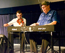 Roddie MacInnis on fiddle, accompanied by Doug MacPhee on keyboard