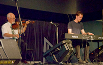 Denis Larade on fiddle, accompanied by Joe MacMaster on keyboard