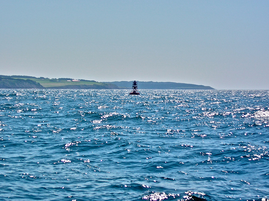 Red buoy at the mouth of the Mabou River