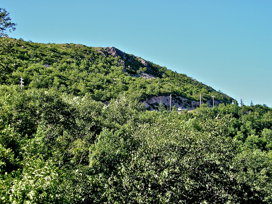 The Cabot Trail near the summit of Smokey Mountain seen from the road below