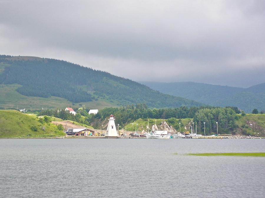 Looking across The Flats to the lighthouse at Mabou Harbour Mouth below the Cape Mabou Highlands