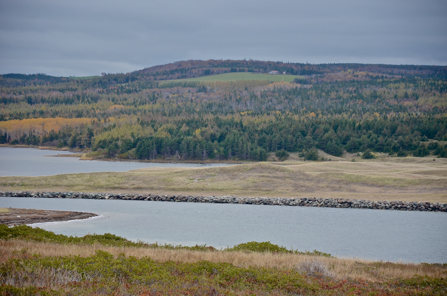 Between the breakwater and the cliffs at the mouth of the Mabou River