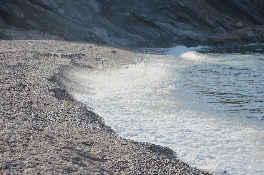 Waves crash at the mouth of Meat Cove Brook