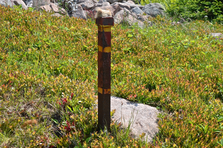 The stake that marks the start/end of the Cape St Lawrence Trail