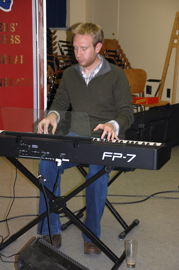 Photo of Adam Young on keyboards