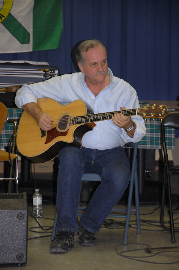 Photo of Ernie Fraser on guitar