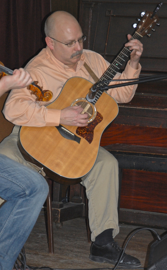 Photo of Michael Kerr on guitar