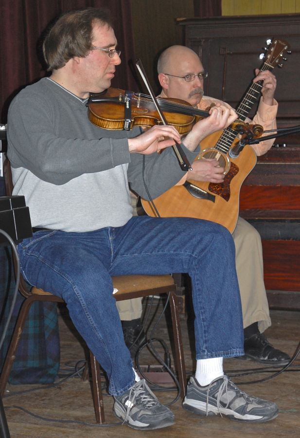 Photo of Gordon Aucoin on fiddle with Michael Kerr on guitar