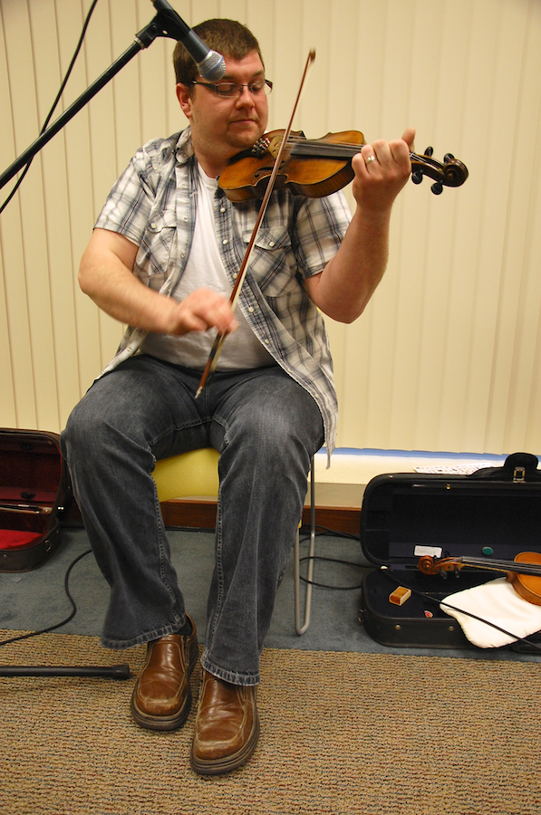 Photo of J. J. Chaisson on fiddle