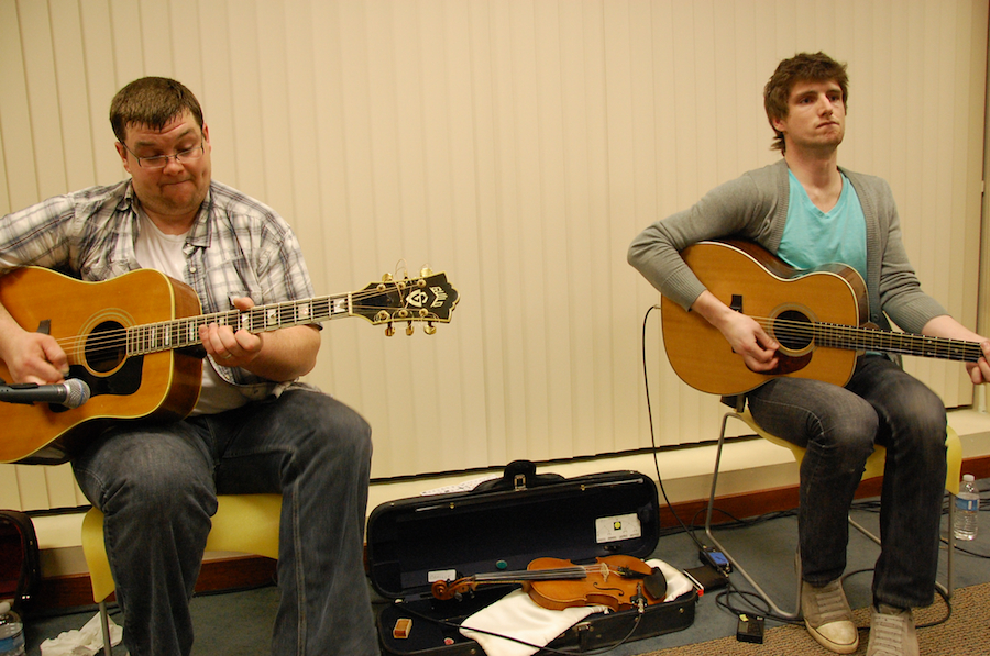 Photo of J. J. Chaisson and Koady Chaisson on guitar