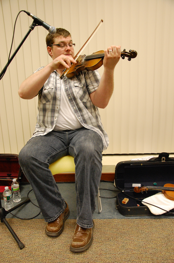Photo of J. J. Chaisson on fiddle