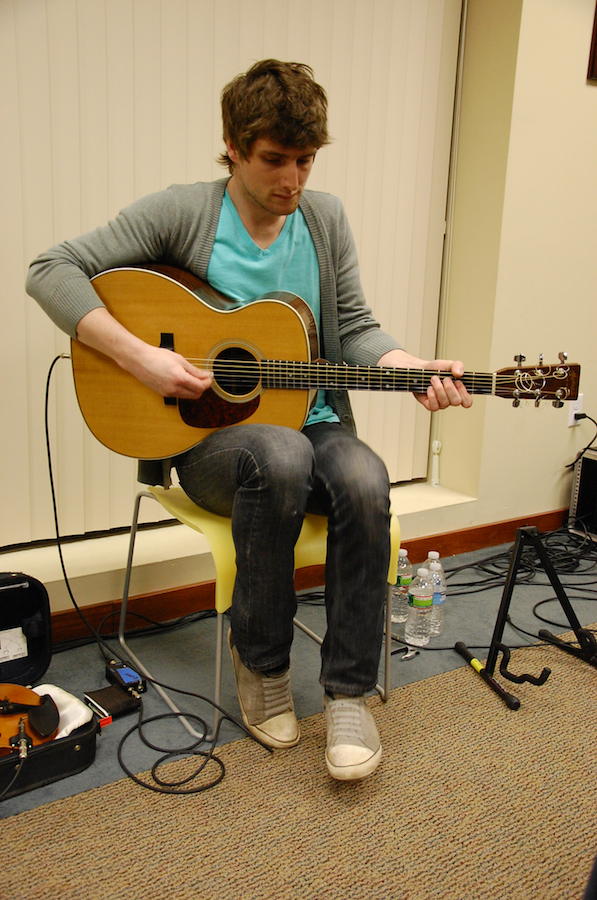 Photo of Koady Chaisson on guitar