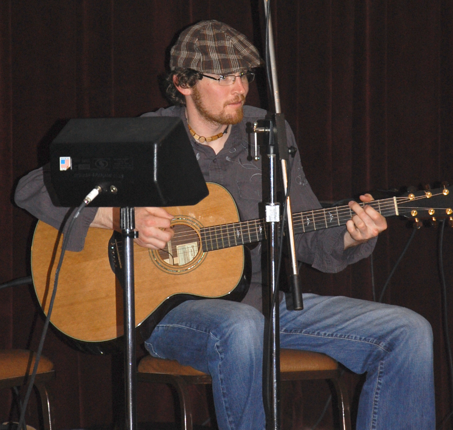 Photo of Jason MacDonald on guitar