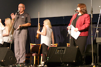 Bob MacEachern and Wendy Bergfeldt open the Gala Concert as members of the Cape Breton Fiddlers’ Association take the stage