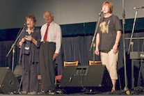 Janet Cameron, Fr Francis Cameron, and Betty Lord singing Gaelic songs a cappella