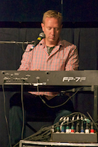 Adam Young playing a solo on keyboard