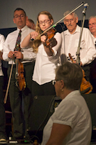 Mckayla MacNeil on fiddle playing a lament