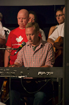 Adam Young accompanying on keyboard