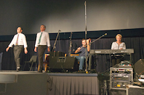 John and Bill Pellerin step dancing to the music of Brent Aucoin on fiddle and Betty Lou Beaton on keyboard