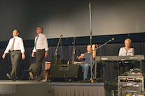 John and Bill Pellerin step dancing to the music of Brent Aucoin on fiddle and Betty Lou Beaton on keyboard