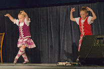 Tiona Aucoin and Amelie Bates performing a sword dance