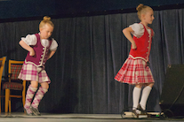 Tiona Aucoin and Amelie Bates performing a sword dance