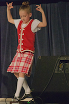 Amelie Bates performing a sword dance